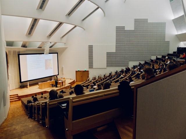 An auditorium style classroom that is very large and inaccessible.