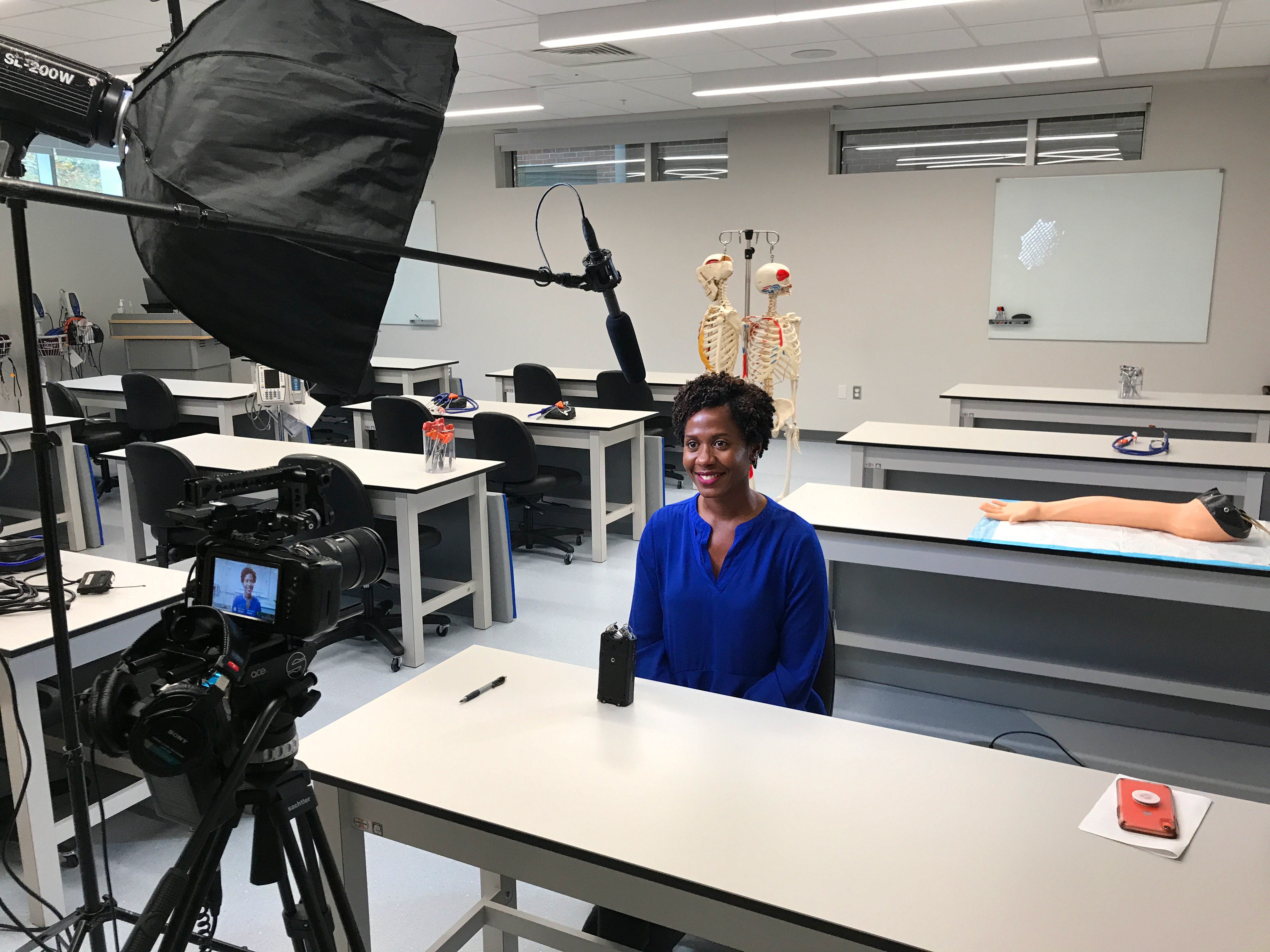 Instructor getting filmed in a classroom